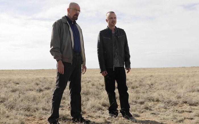 Walter White and Jesse Pinkman from Breaking Bad in a field