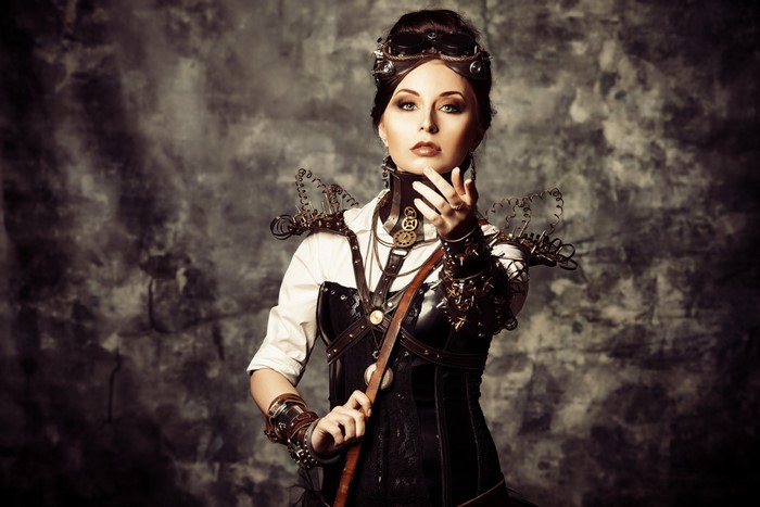 Steampunk woman with goggles and corset