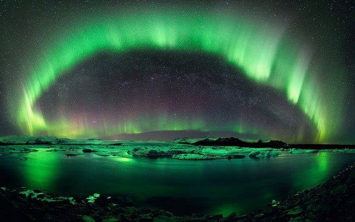 Aurora Borealis over Iceland's glacial lagoon
