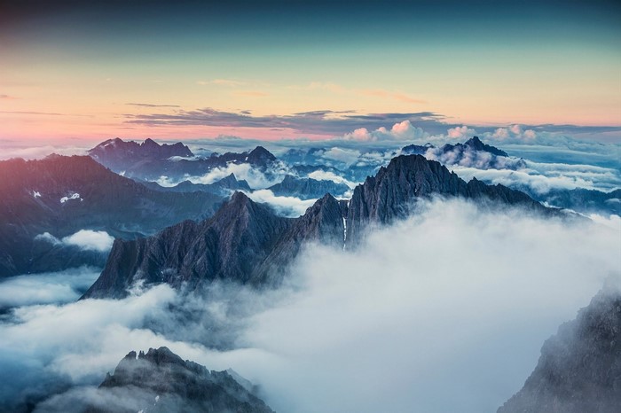 Mountain range with clouds at sunrise