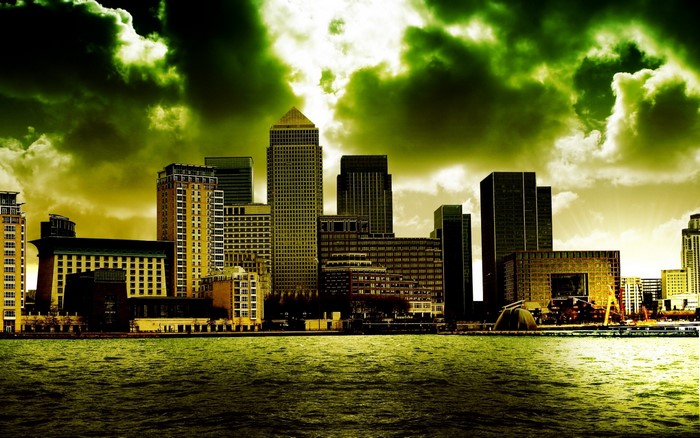 Cityscape of Canary Wharf with dramatic green clouds