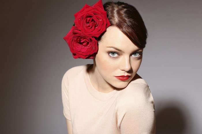 Emma Stone with red roses in her hair
