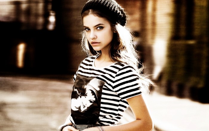 Barbara Palvin wearing a striped t-shirt and beanie