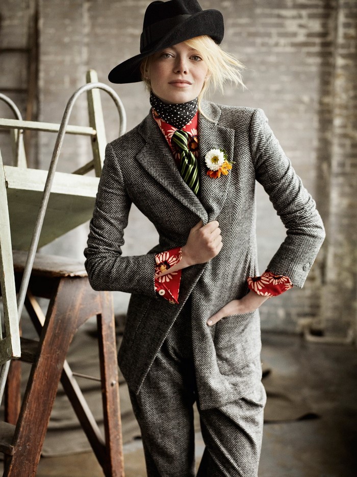 Emma Stone in a stylish suit and hat