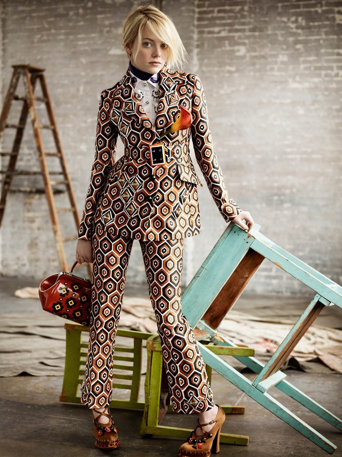 Emma Stone in patterned suit with accessories