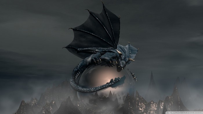Black dragon perched on a sphere