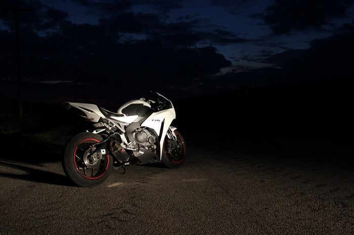 White Honda CBR 1000 RR motorcycle at night