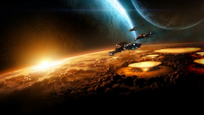 Starcraft II ships over a burning planet with a sunrise