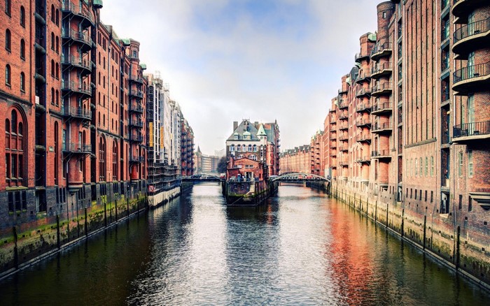 Speicherstadt Hamburg canal with brick warehouses and bridges
