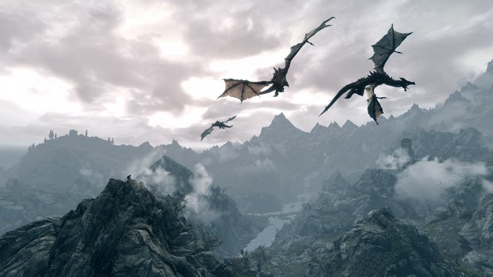 Dragons flying over mountains in The Elder Scrolls V Skyrim