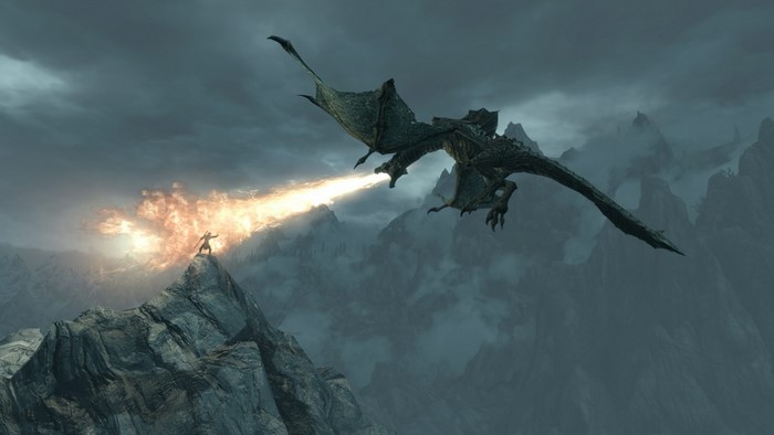 Dragon breathing fire on a person in Skyrim