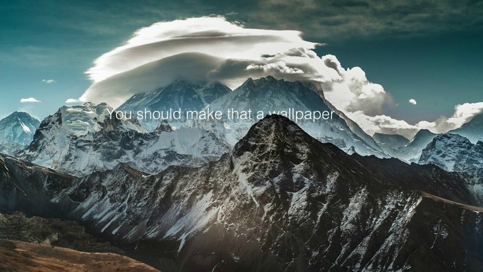 Mountains with clouds and text