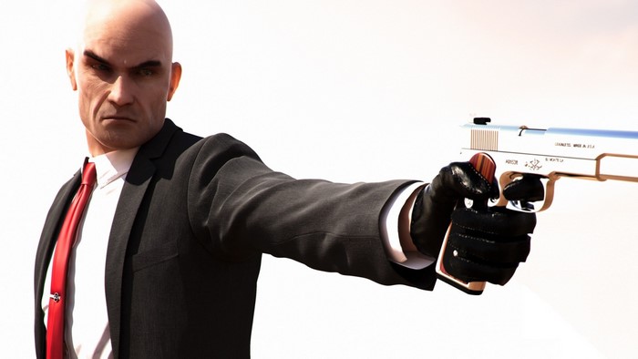 Agent 47 from Hitman holding a pistol