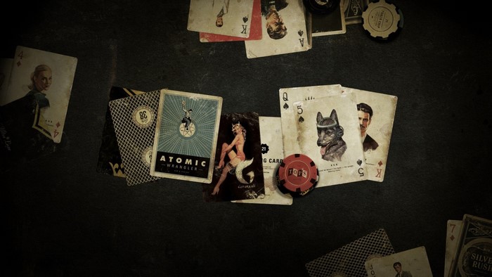 Playing cards and poker chips on a dark surface