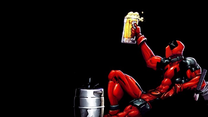 Deadpool holding a beer mug next to a keg