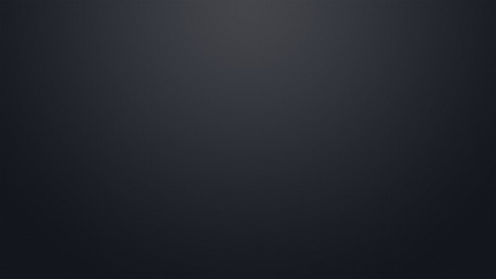 Dark textured surface with subtle lighting
