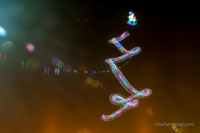 Light painting of abstract shapes and numbers at night