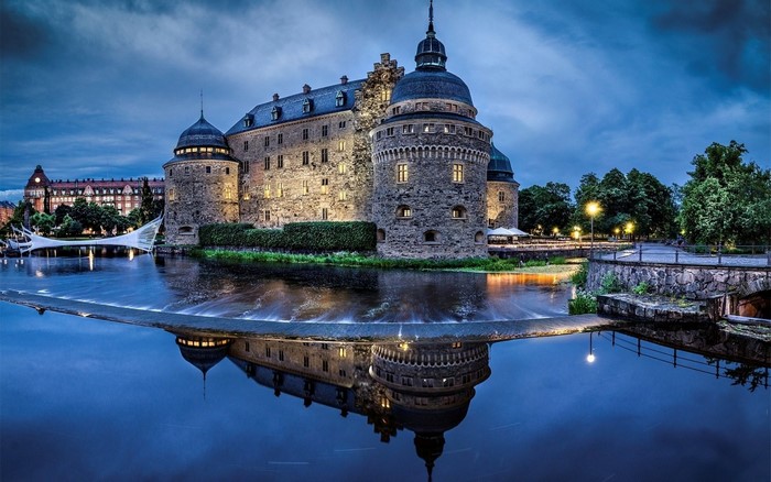 Örebro Castle at Night with Reflective Water