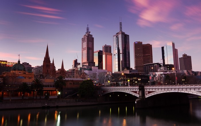 Melbourne cityscape at dusk with Yarra River and Princes Bridge