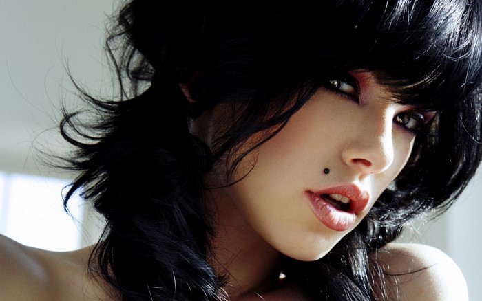 Close-up Portrait of Woman with Black Hair