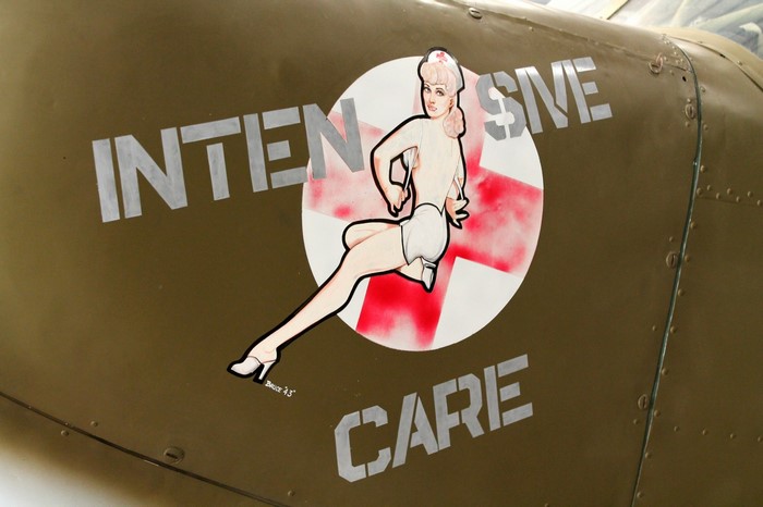 Nose Art of a Nurse on an Airplane