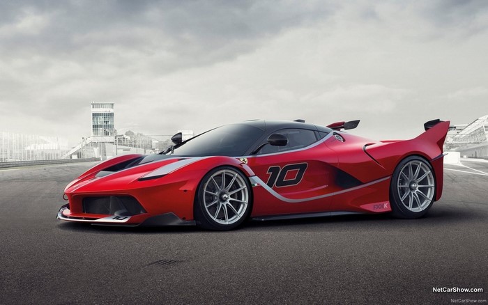 Red Ferrari FXX K with number 10 on a race track