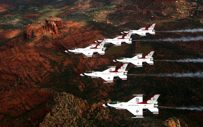 US Air Force Thunderbirds flying over red rock formations