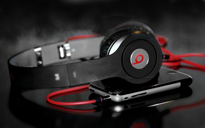 Beats Solo headphones connected to an iPhone
