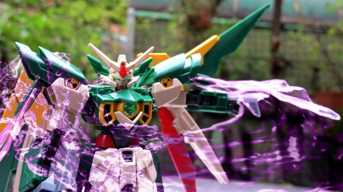 Gundam toy with purple energy effects