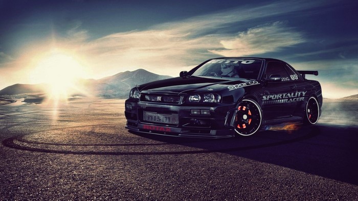 Black Nissan Skyline R34 sports car drifting