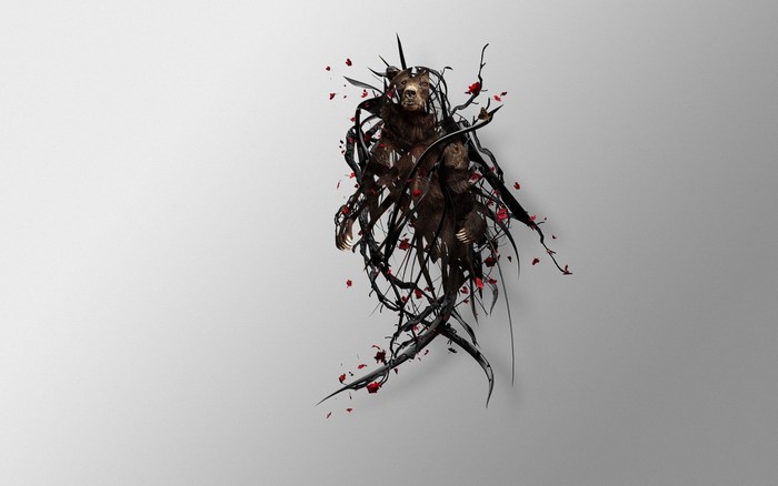 Bear entangled in thorny branches with red flowers