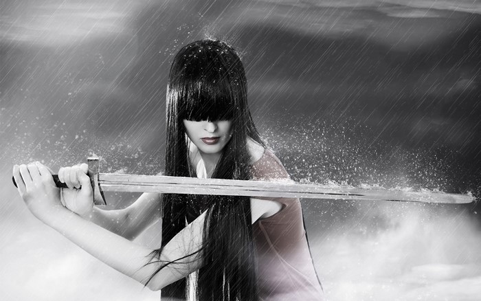 Woman with sword in the rain