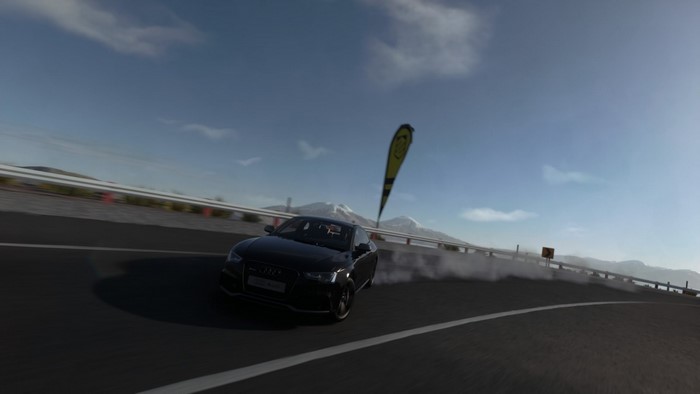 Audi RS5 drifting on a mountain road in Driveclub