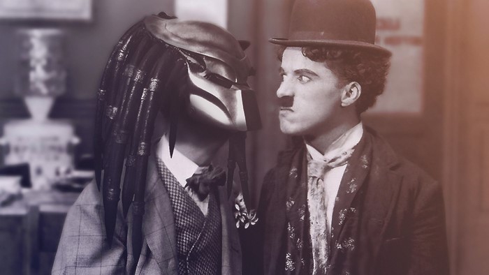 Predator and Charlie Chaplin in a black and white photograph