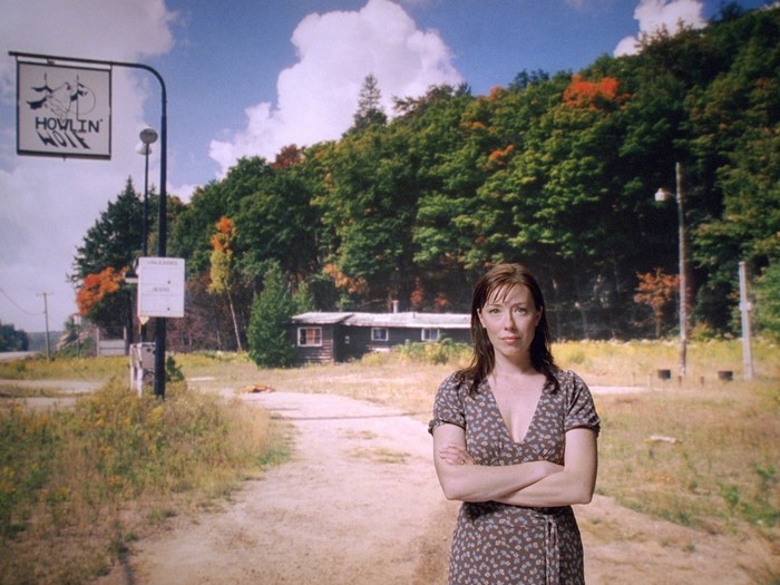 Molly Parker in front of Howlin' Motel sign