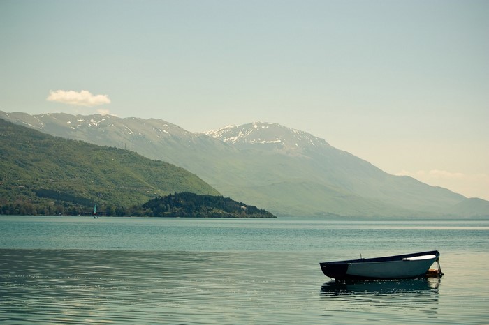 Boat on Lake Ohrid with Mountains in Macedonia