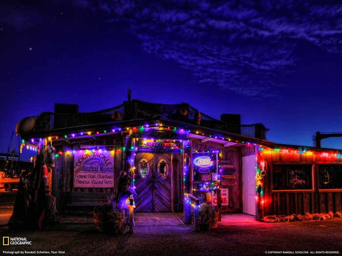 Dock Tackle Nautical Museum decorated with Christmas lights at night