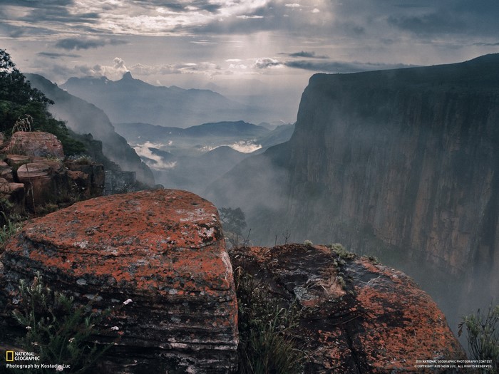 Misty Mountain Valley with Red Rocks