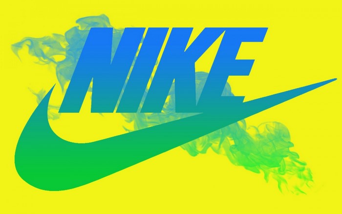 Nike logo with blue and green gradient and smoke effect
