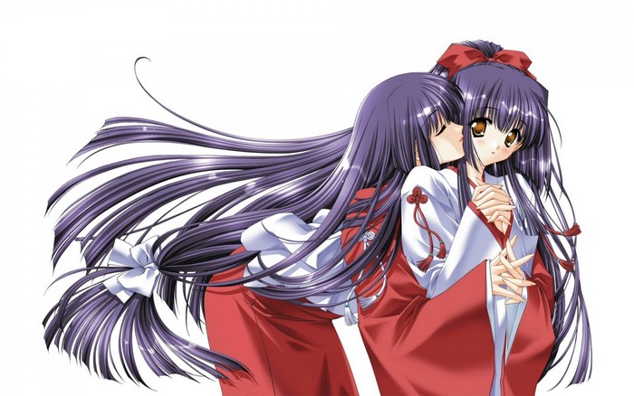 Two Miko girls in red and white outfits
