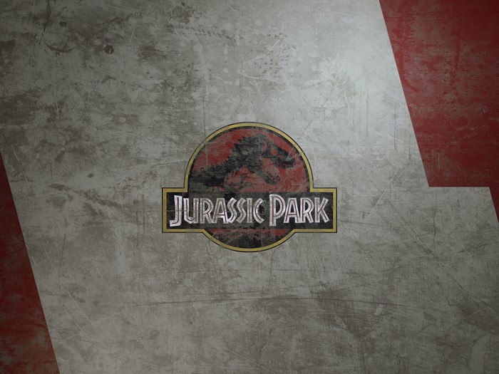 Jurassic Park logo on a textured surface