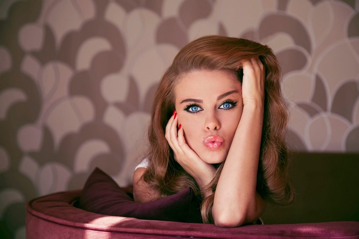 Portrait of a Woman with Blue Eyes and Auburn Hair