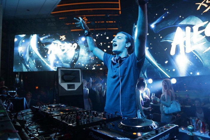 DJ Alesso performing at a nightclub