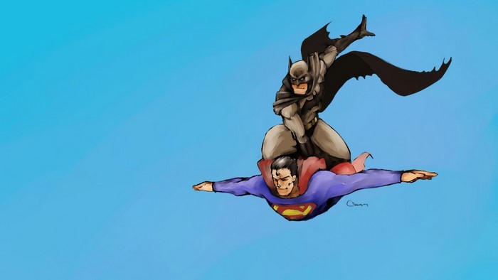 Batman riding on Superman flying in the sky