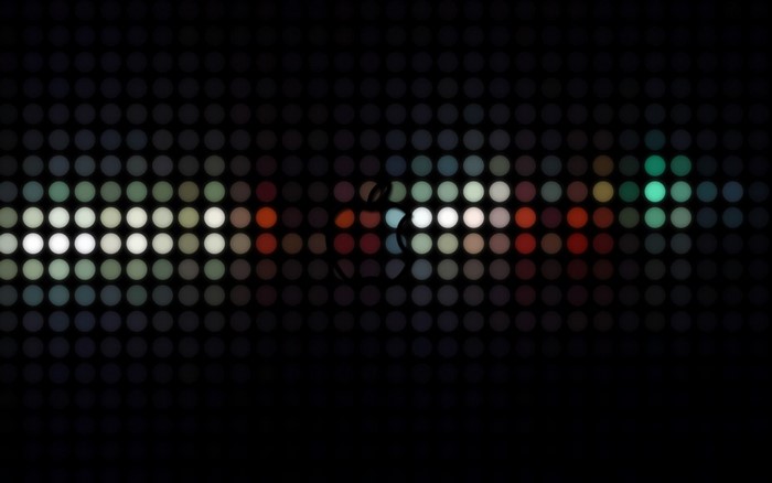 Abstract digital art with colorful dots on black background