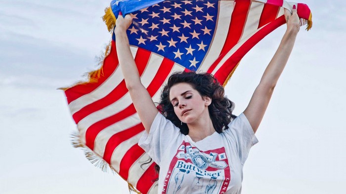Lana Del Rey holding the Flag of the United States