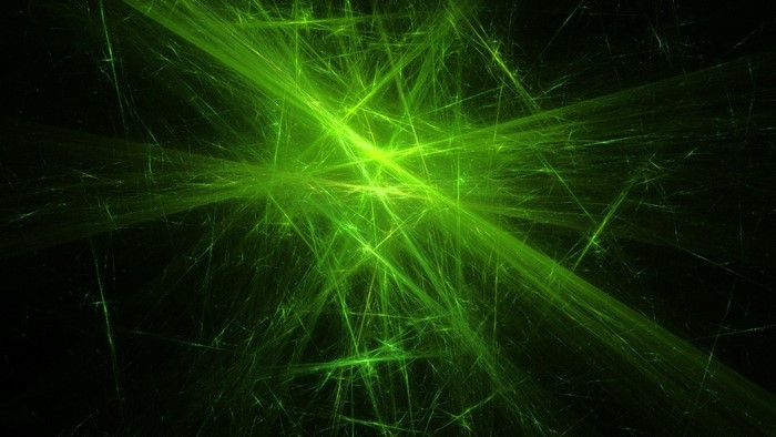 Abstract green light streaks on black background