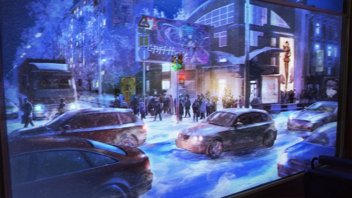 Cars in a snowy city street at night
