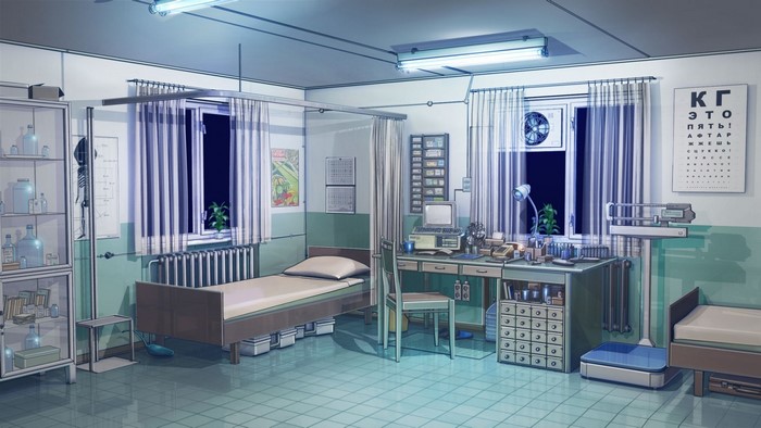 Hospital room interior with beds, desk, and medical equipment