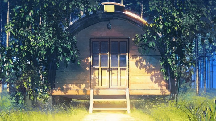 House in a sunlit forest